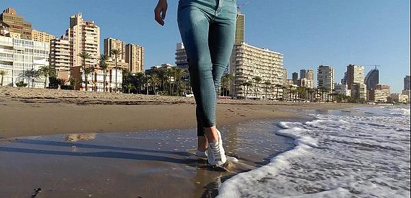  Wet shoot on a public beach with Crazy Model. Risky outdoor masturbation. Foot fetish. Pee in jeans.